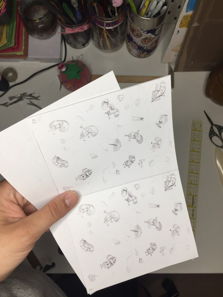 9. Match the white backs of pages together.