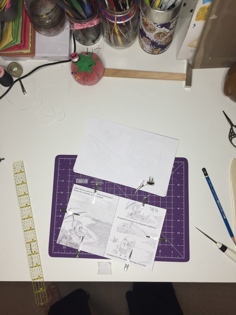 15. Have clips in place ensuring book doesn't shift around. When adding holes and sewing.